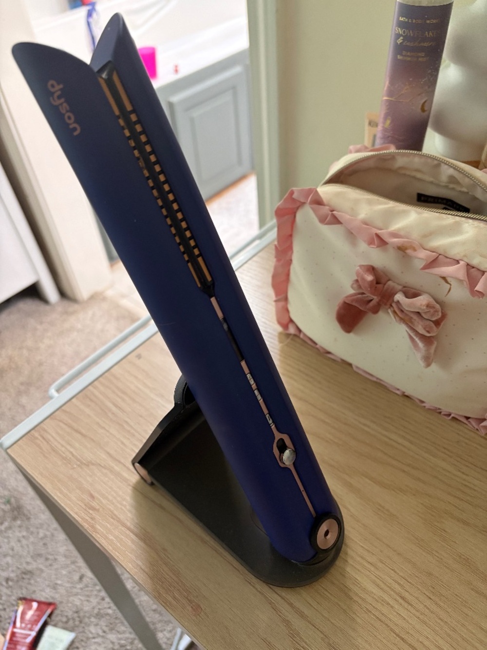 Dyson corrals hair straightener